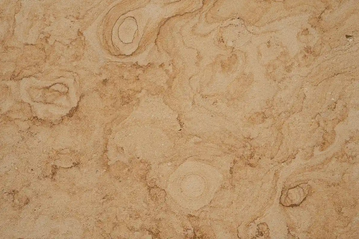 Close-up of a loose, sand-like reptile substrate with irregular texture